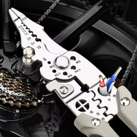 Pince multifonctionnelle pour denuder